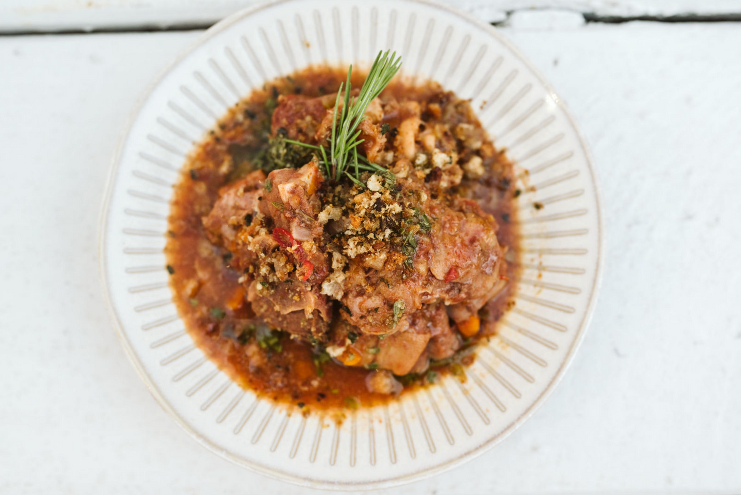 Slow roasted goat in fino, rosemary pangritata