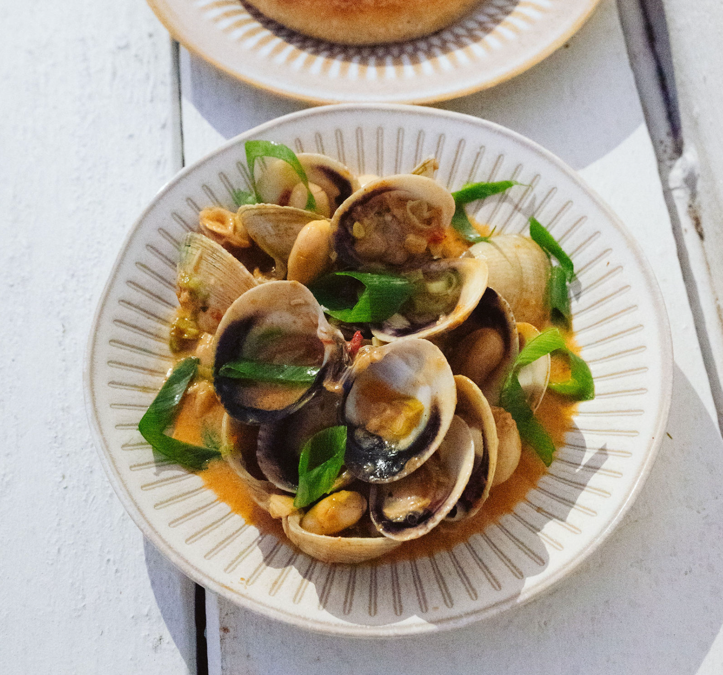 Clams, harissa, lima beans, colatura